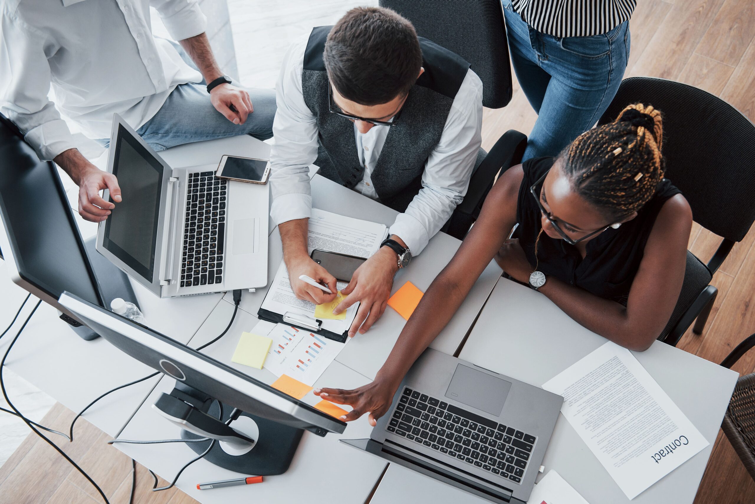 group-multinational-busy-people-working-office-min